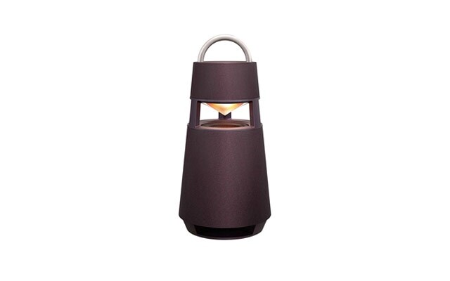 A burgundy LG XBOOM 360 omnidirectional Bluetooth speaker is centered against a white background