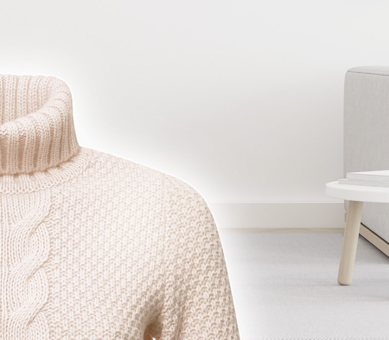 A sweater is shown with a line down the center. The left side labeled "Conventional Heater/Gas Dryer" while the right side labelled "LG DUAL Inverter Heat Pump Dryer". The sweater on the left shrinks in and the sweater on the right is preserved in shape and still stays soft.