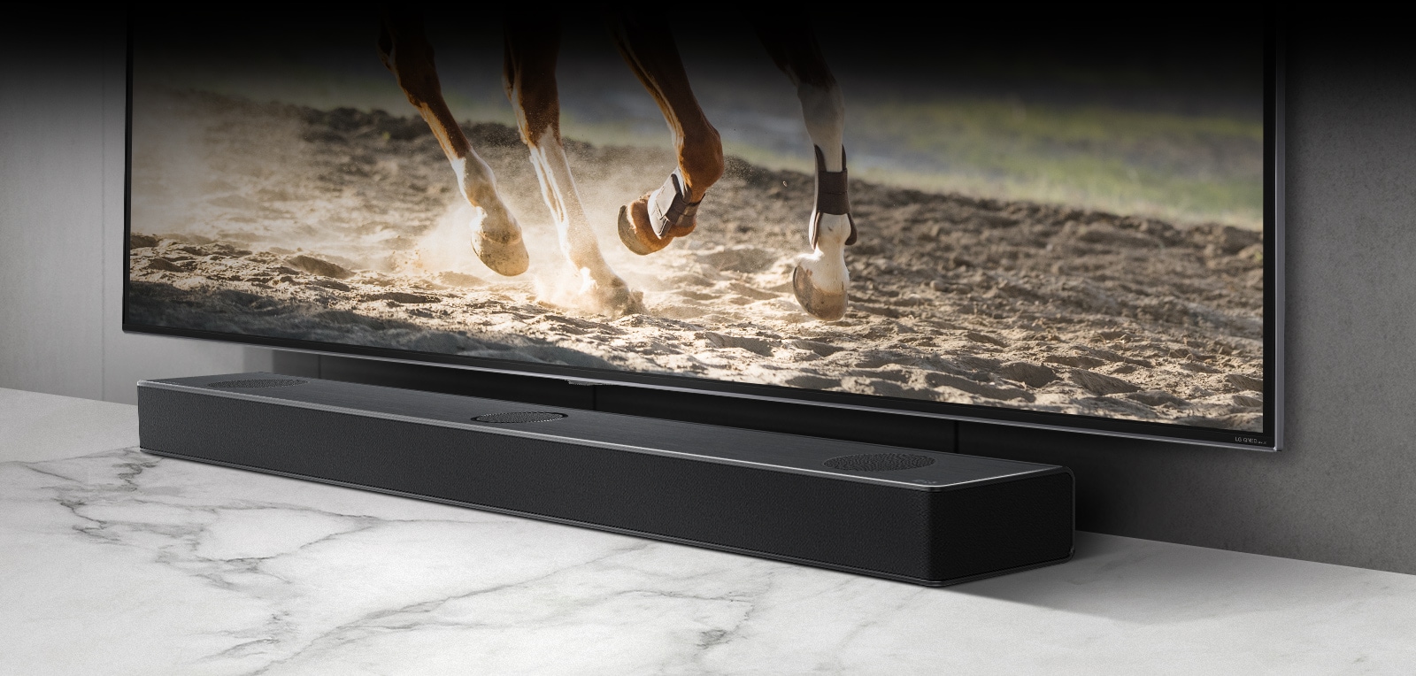 The perfectly paired is shown through a close-up shot of the matching TV and sound bar.