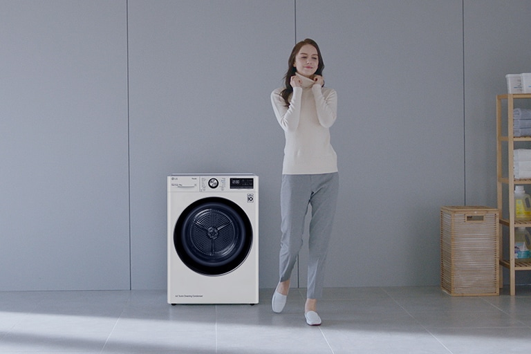 Woman standing near LG dryer