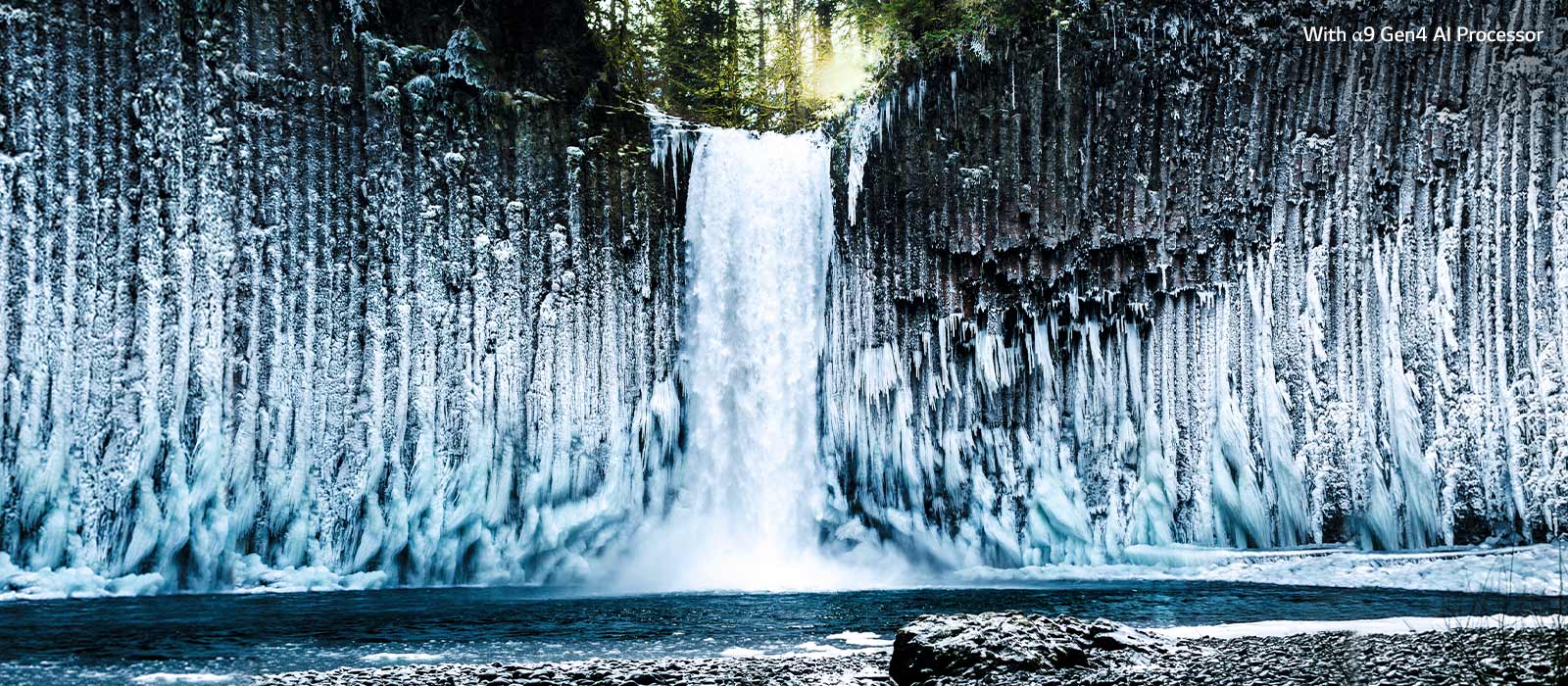 Slider comparison of picture quality of a frozen waterfall in a forest.