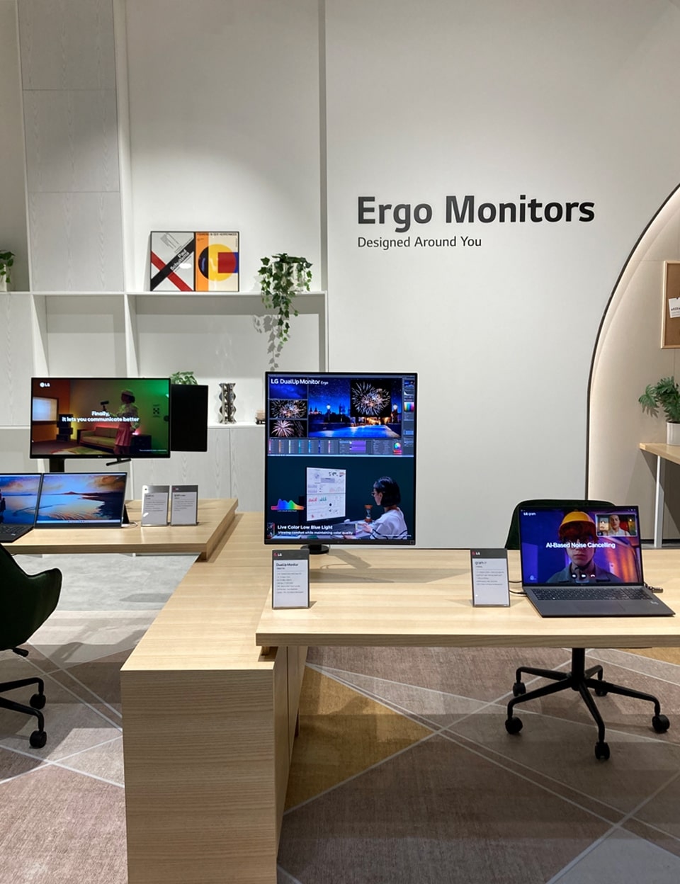 An LG Ergo AI monitor is adjusted to the correct monitor height and distance