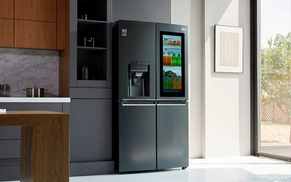 The LG Instaview Door-In-Door refrigerator with its contents visible through the mirrored glass panel.