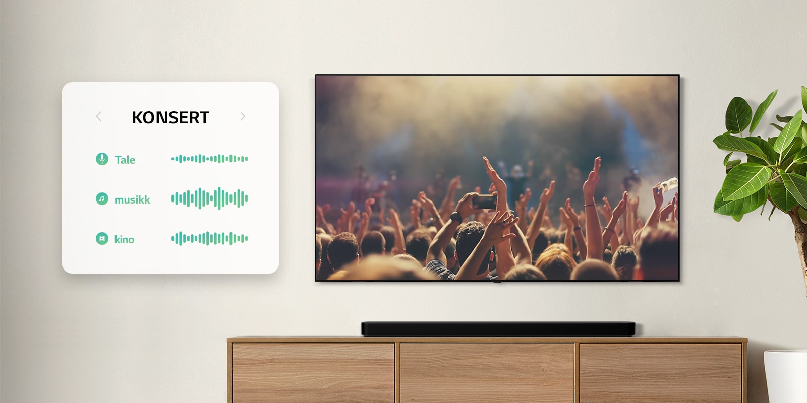 TVen er på veggen. TV viser mennesker som klapper på en konsert, kanalen byttes til en filmscene med en bil som kjører i en skog, kanalen byttes nok en gang, nå til nyheter med en nyhetsanker som snakker. LG Lydplanke er like under TV på en beige hylle. (spill av videoen)