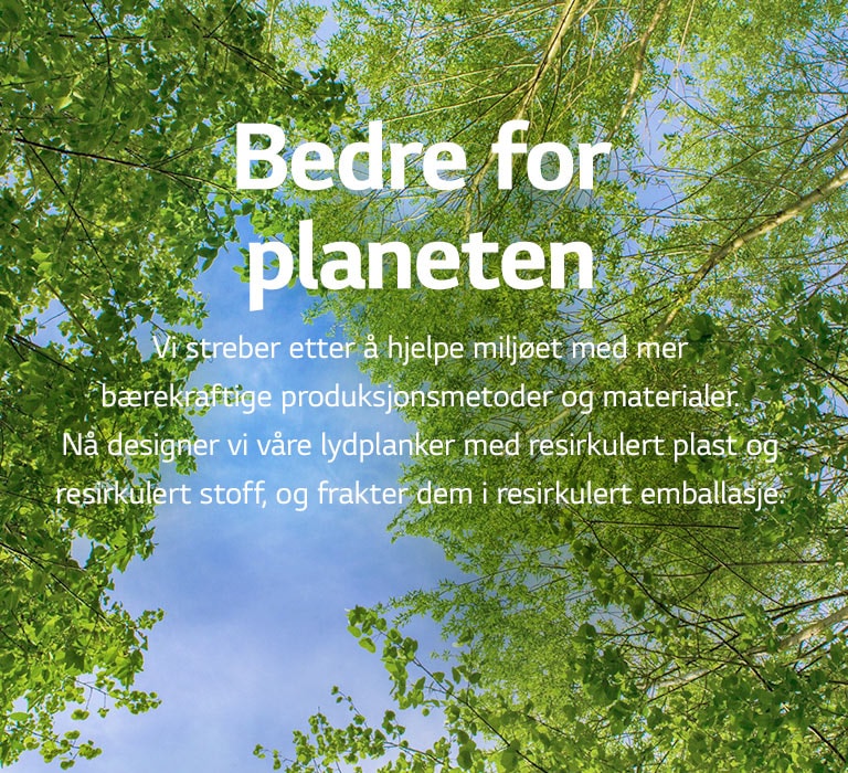 Et grønt bilde fullt av kraftige løvtrær og mellom trærne vises en sky