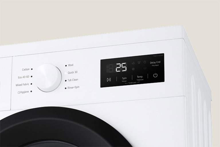 Nærbilde av vaskemaskinens skive og panel