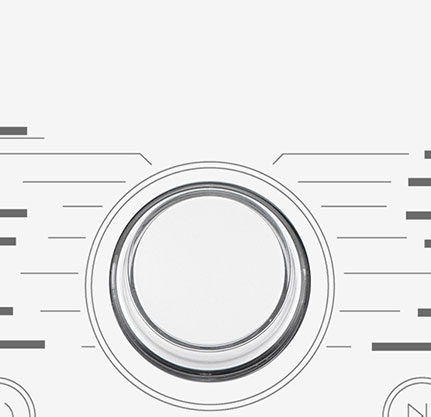 Dette er et forstørret bilde av metallknotten på panelet på en vaskemaskin.