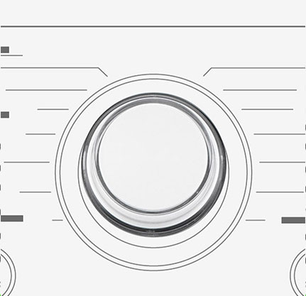 Dette er et forstørret bilde av metallknotten på panelet på en vaskemaskin.