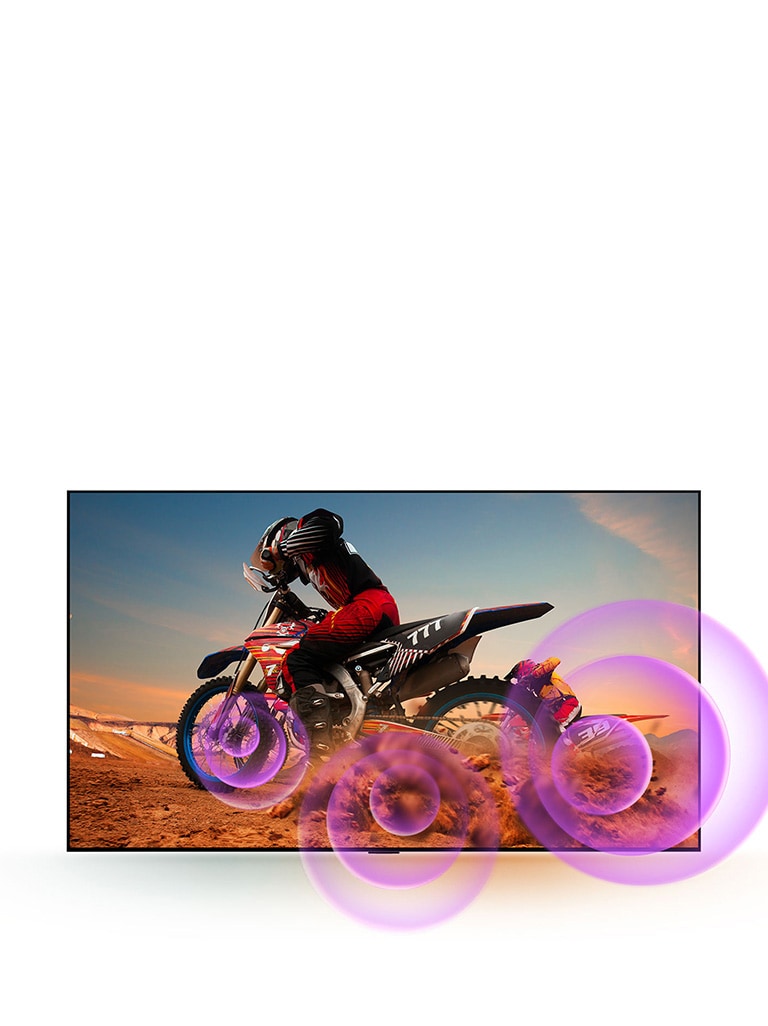 LG OLED TV viser en mann på en motorsykkel med lilla abstrakte sirkler som kommer ut av hjulet for å visualiser lydutgivelsen.