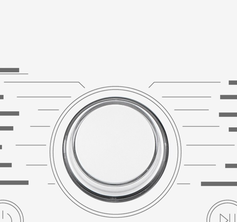 Dette er et forstørret bilde av metallknotten på panelet på en vaskemaskin.