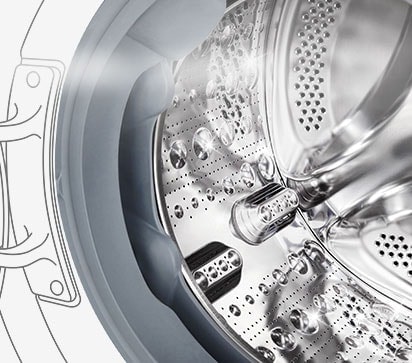 Bildet av innsiden av vaskemaskinen hvor de rustfrie trommelribbene kan sees.