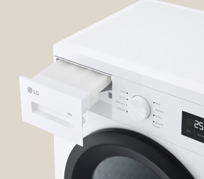 Nærbilde av vannbeholderen på tørketrommelen.