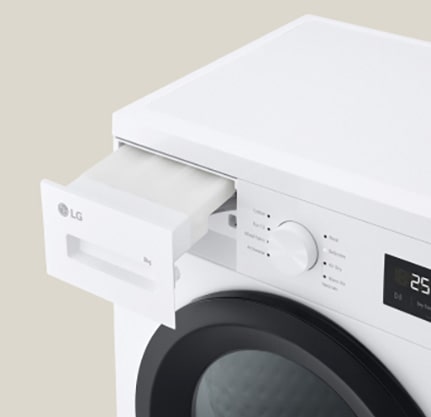 Nærbilde av vannbeholderen på tørketrommelen.