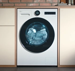 LG hvit frontmatet vaskemaskin med tørketrommel (WHX9516TLC) viser en transparent trommel med fem piler som illustrerer den store trommelkapasiteten.