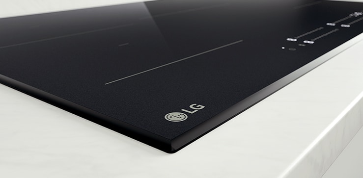 Det hvite LED-lyset på Induksjonsplatetoppen.