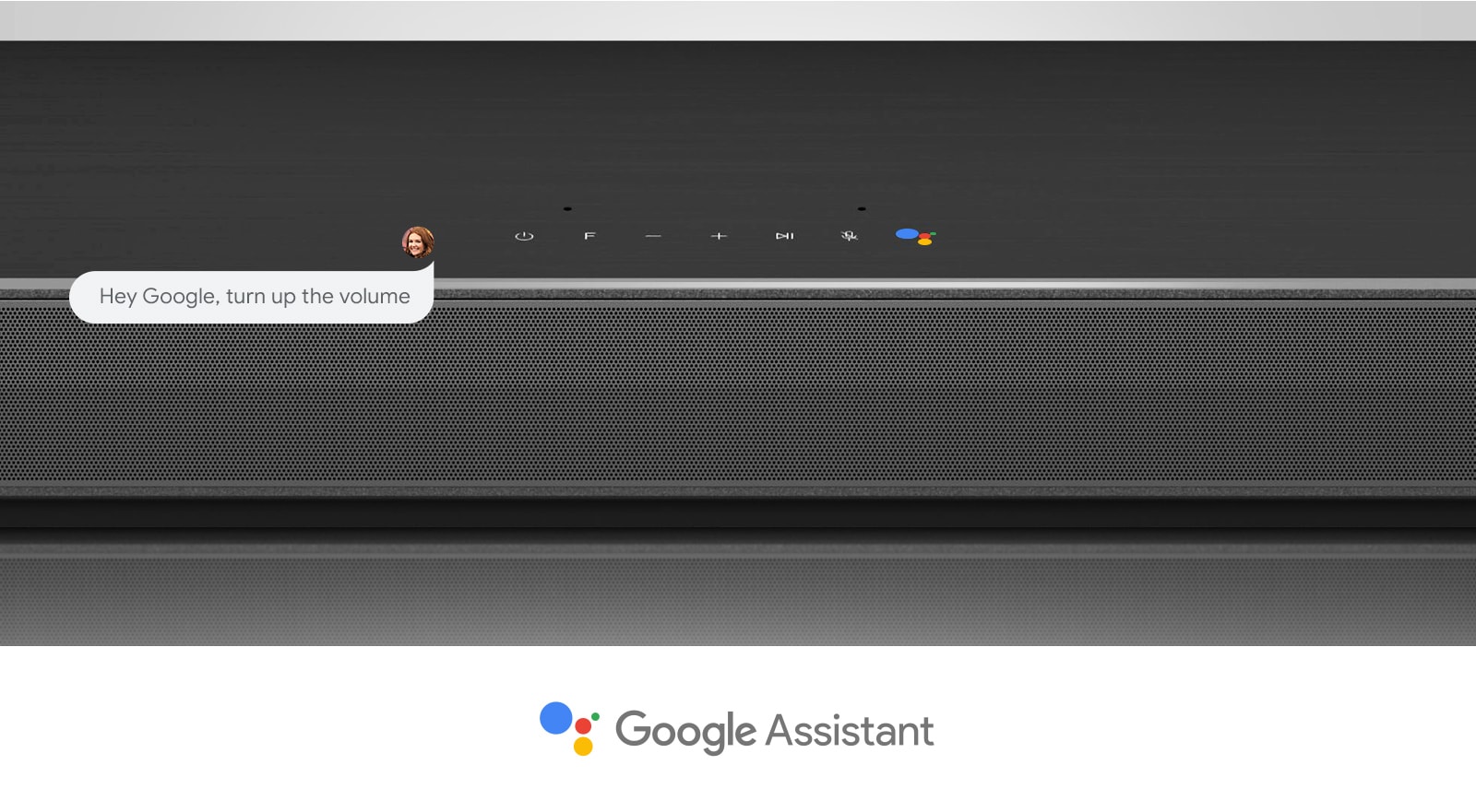 Nærbilde av LG-lydplankens midtseksjon med lydkontroller og Google Assistant-logoen. Du kan skru opp volumet med Googles talekommandoer. 
