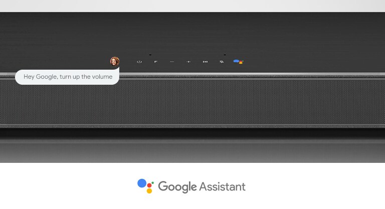 Nærbilde av LG-lydplankens midtseksjon med lydkontroller og Google Assistant-logoen. Du kan skru opp volumet med Googles talekommandoer. 