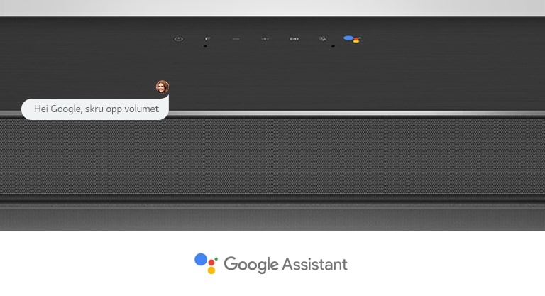 Nærbilde av LG-lydplankens midtseksjon med lydkontroller og Google Assistant-logoen. Du kan skru opp volumet med Googles talekommandoer. 