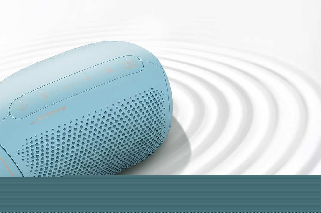 LG XBOOMGo PL2B, LG XBOOMGo PL2B, A top view of an LG XBOOM Go on a white surface with a ripple effect, PL2B, PL2B, thumbnail 3