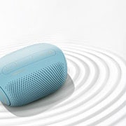 LG XBOOMGo PL2B, LG XBOOMGo PL2B, A top view of an LG XBOOM Go on a white surface with a ripple effect, PL2B, PL2B, thumbnail 3