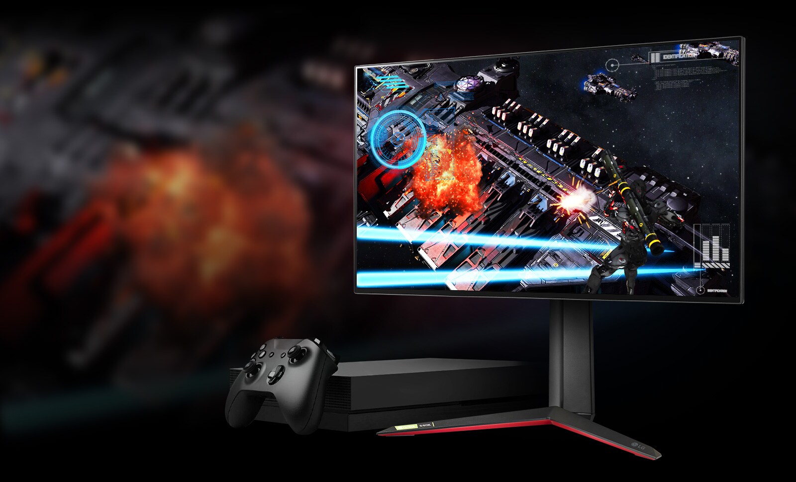 27GP95R-monitor med skytespill på skjermen. Et konsollspill ligger ved siden av monitoren.