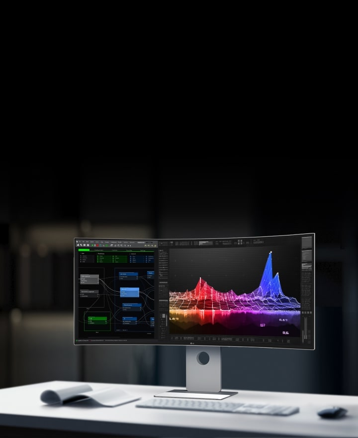 LG UltraFine-skjerm på et skrivebord som viser fargerike datavisualiseringer og et kodegrensesnitt i et moderne kontormiljø.