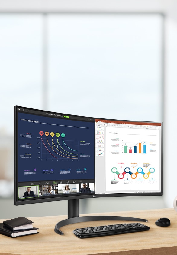 En moderne hjemmekontoroppsett med en stor ultrabred LG-skjerm som viser datadashbord, 3D-grafikk og prosjektstyringsverktøy, med et trådløst tastatur og mus på et trebord.