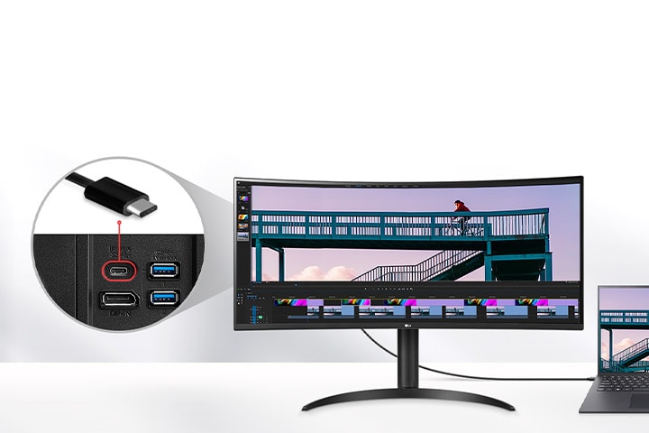 UltraWide Monitor koblet til en bærbar PC via en USB-C-kabel, som viser et videoredigeringsprosjekt med en syklist på en bro, med et nærbilde av USB-C-porten og fremheving av 96 W strømleveringskapasitet.