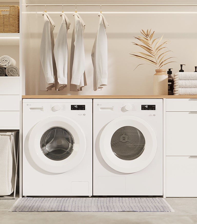 Innvendig bilde med vaskemaskin og tørketrommel side om side