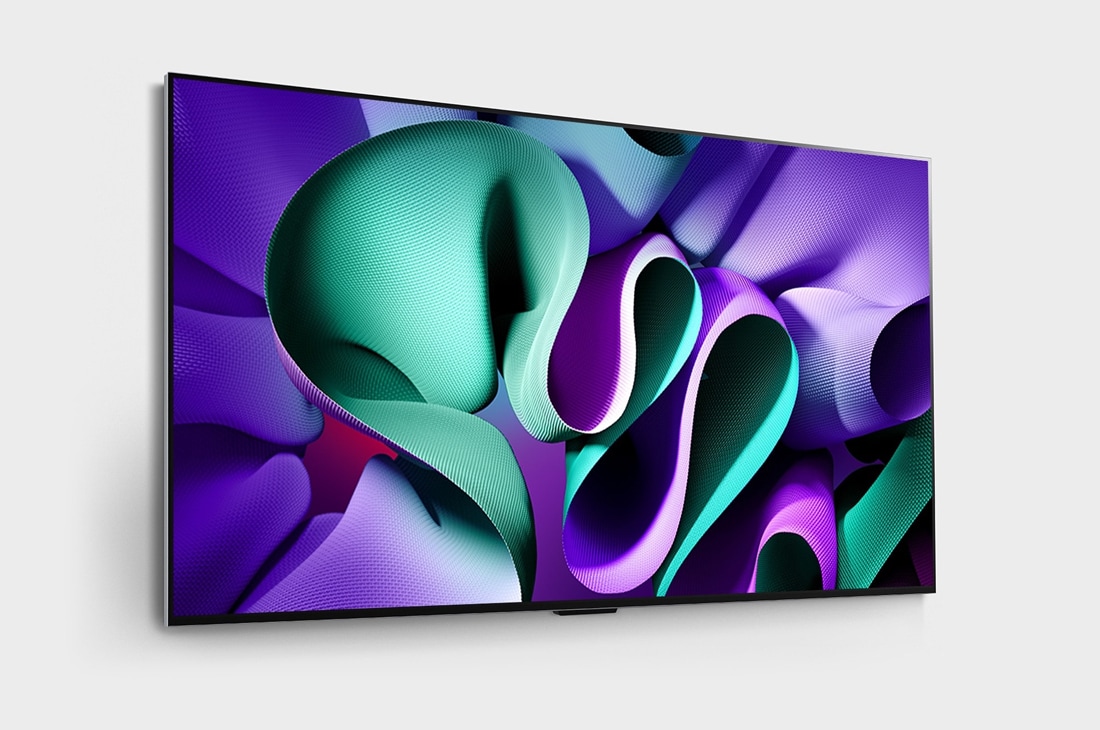 LG Verdens første ekte trådløse TV 77 tommer LG OLED evo AI M4 med 4K 144 Hz video- og lydoverføring , Loivasta kulmasta oikealta otettu sivukuva LG OLED evo, OLED M4 -televisiosta seinällä, OLED77M49LA, thumbnail 3