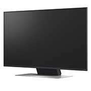 LG 50'' QNED AI QNED87 4K Smart TV 2025, LG AI Magic Remote er i forgrunnen. AI-knappens ikon er fremhevet. I bakgrunnen ses LG webOS UI. Muspekeren viser at fjernkontrollen er i bruk. Teksten forklarer hvordan fjernkontrollens funksjoner og, 50QNED87A6D, thumbnail 14