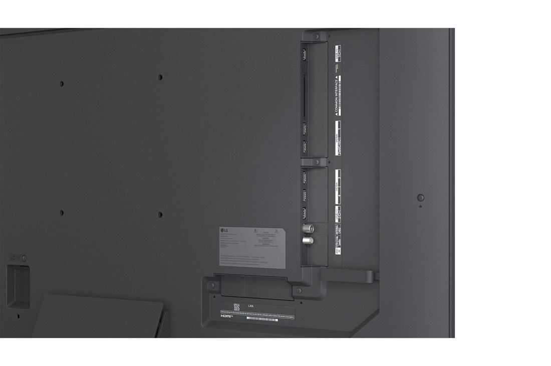 LG 50'' QNED evo MiniLED QNED87 4K AI TV - 2026, LG QNED evo AI QNED85 Mini LED med supertynn design er veggmontert i et lyst, åpent oppholdsrom og smelter inn i interiøret mens den viser dristige geometriske abstrakte kunstverk., 50QNED87B6A, thumbnail 12