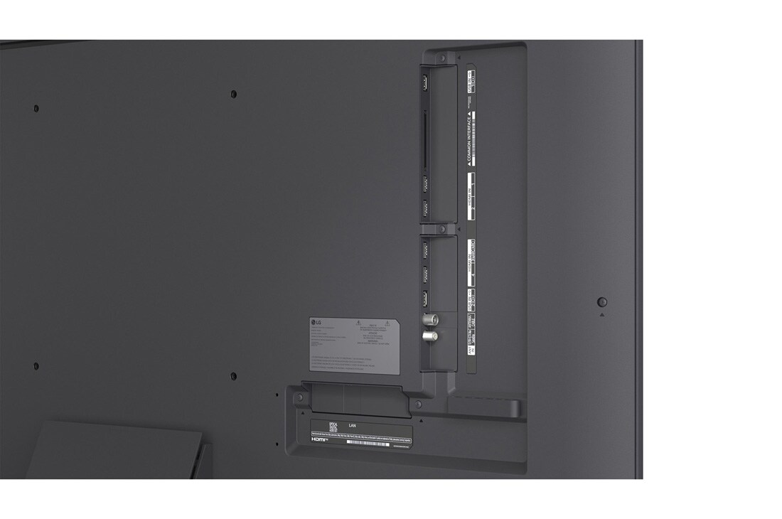 LG 55'' QNED evo MiniLED QNED87 4K AI TV - 2026, LG QNED evo AI QNED85 Mini LED med supertynn design er veggmontert i et lyst, åpent oppholdsrom og smelter inn i interiøret mens den viser dristige geometriske abstrakte kunstverk., 55QNED87B6A, thumbnail 12