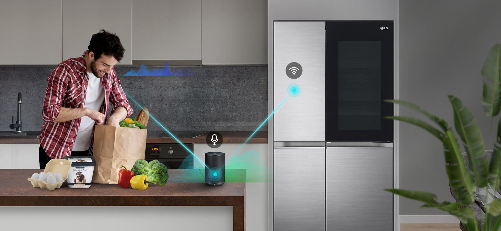 A man stands in a kitchen unloading produce from a grocery bag and speaks, shown by volume bars moving up and down near him, to the AI speaker on the counter telling it to "turn on express freeze". A line appears that goes from the man to the AI speaker which has a microphone icon above it. Then volume bars show up near the AI speaker and a line appears from the AI speaker to the refrigerator which has a Wifi icon above it.