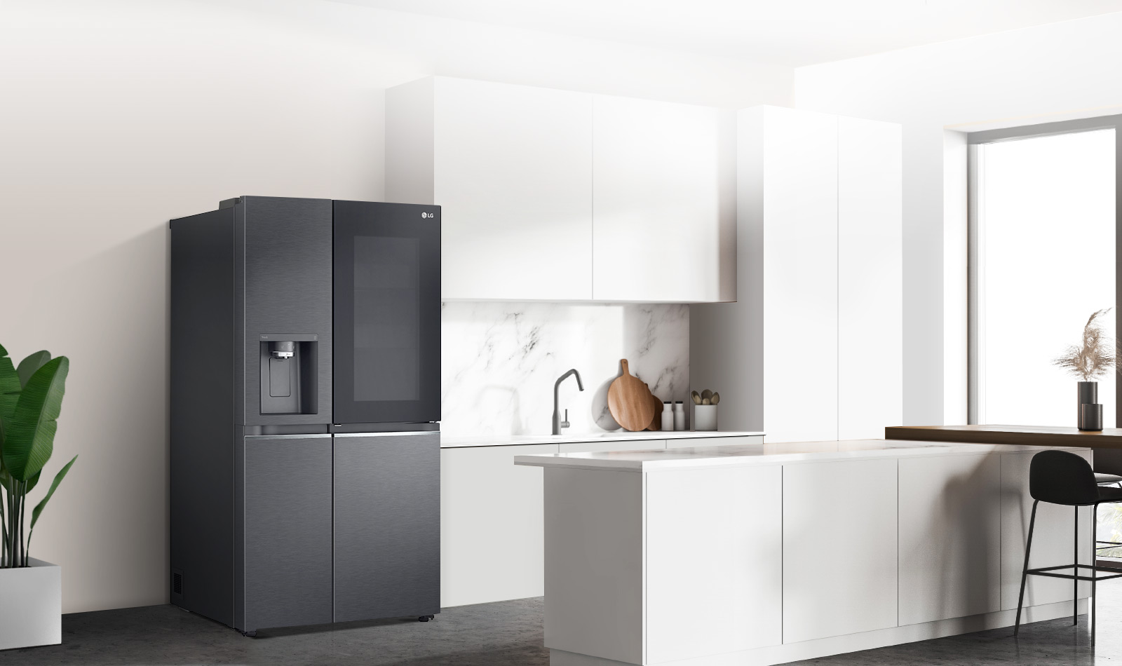 A side view of a kitchen with a black InstaView refrigerator installed.