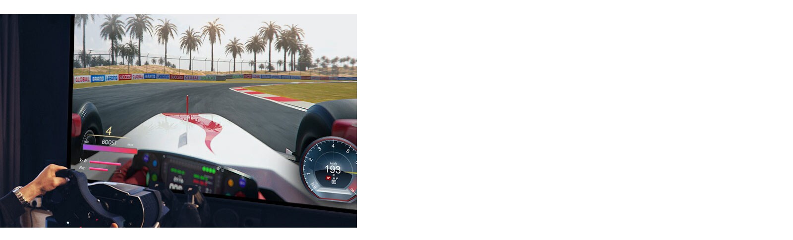 Close up view of player holding a racing wheel playing a racing game on a TV screen.