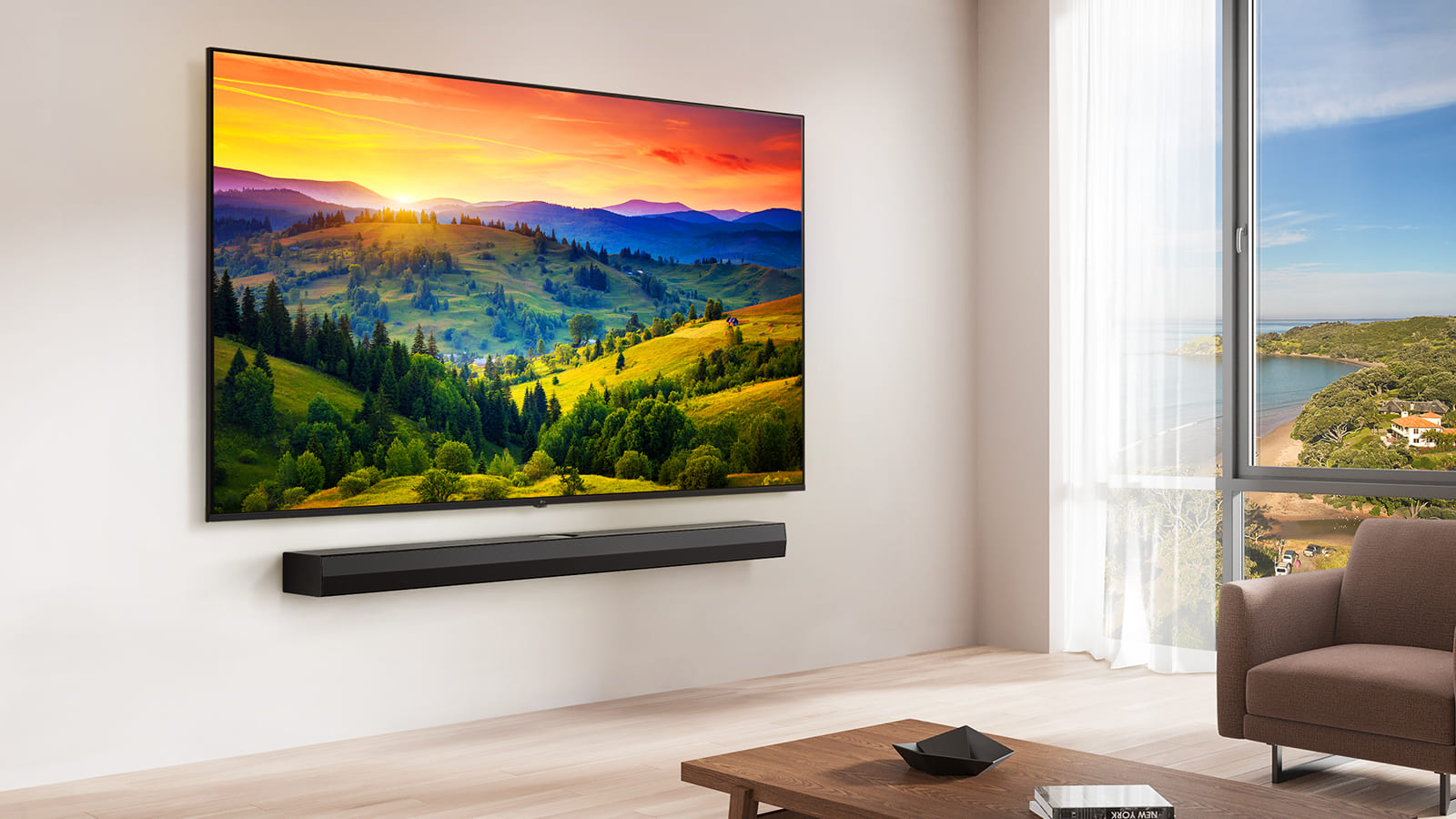 LG UHD TV mounted on a wall above a LG Soundbar in a modern living room space. LG UHD TV depicts a colorful background.