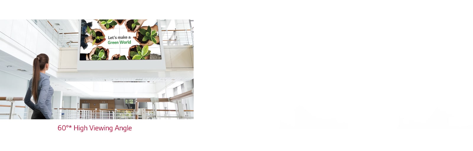 A woman is looking up at the screen installed upstairs.