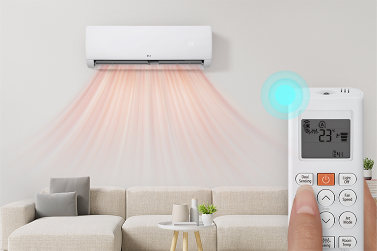 LG air conditioner operating heating mode based on room temperature via the smart button.