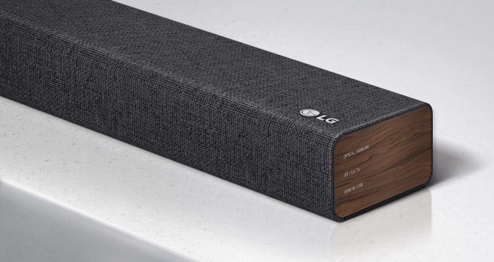 Close-up of LG Soundbar right side with LG logo shown on the bottom right corner of a product.
