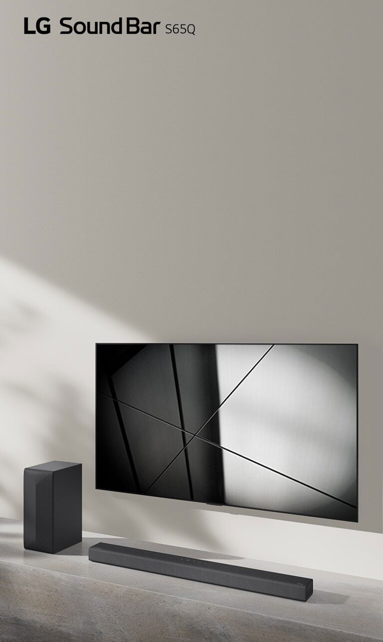 LG sound bar S65Q and LG TV are placed together in the living room. The TV is on, displaying a black and white image.