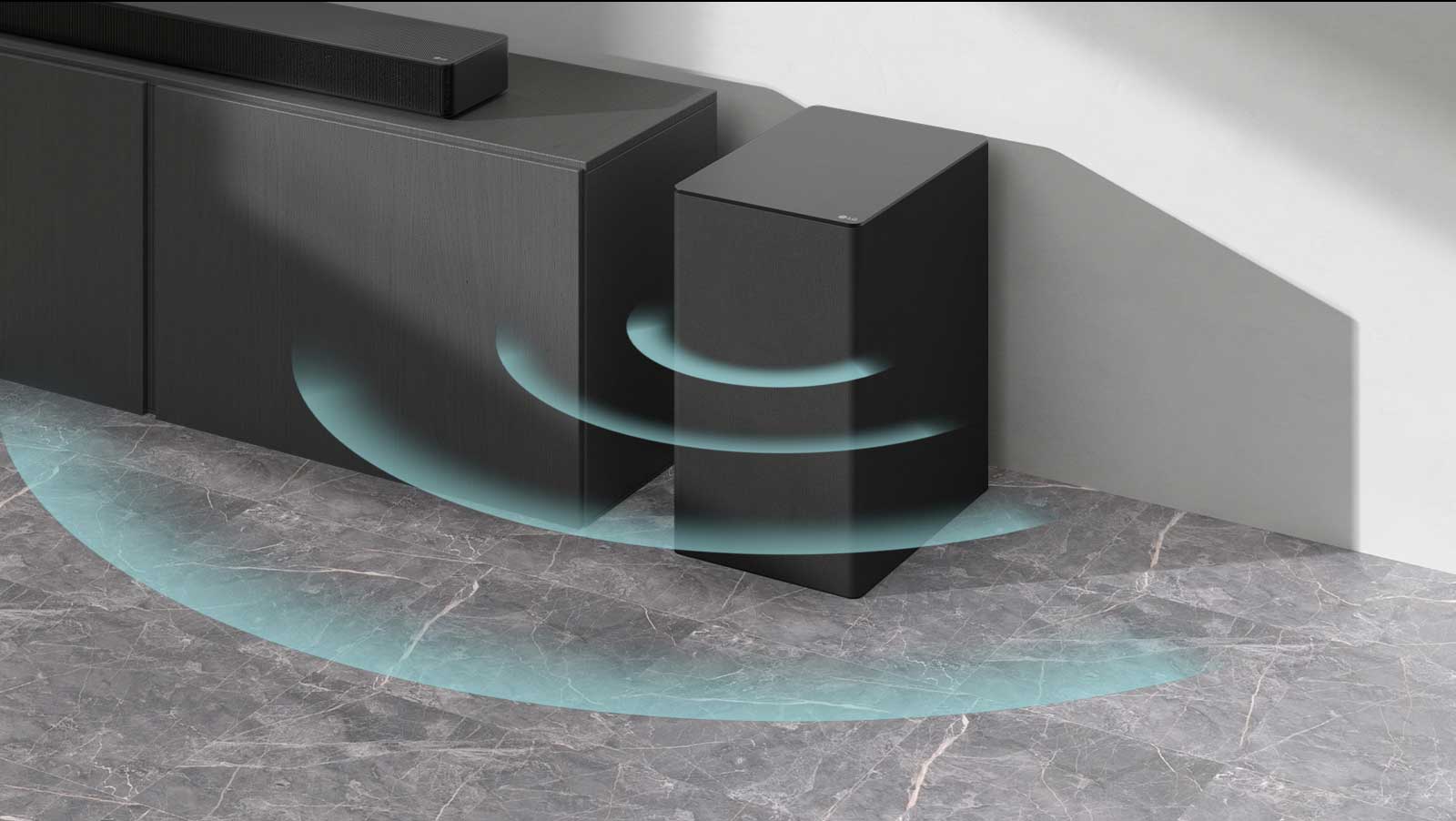 A Soundbar  is placed on the cabinet. Beside a wireless subwoofer placed on the floor. Blue sound graphics are coming out from the subwoofer.