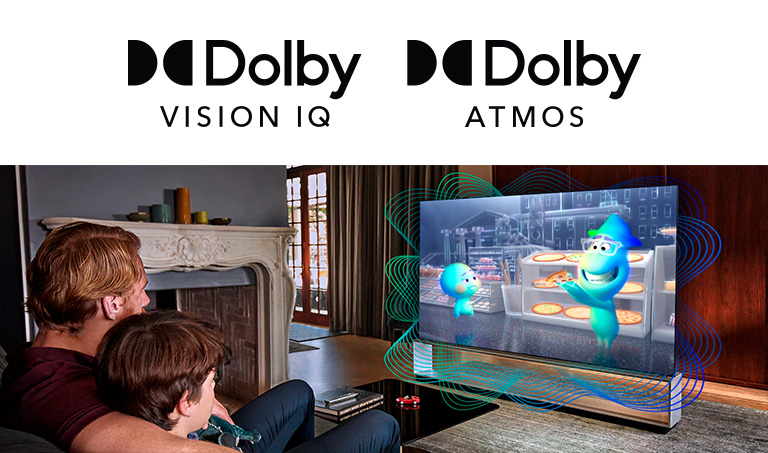 The logo of Dolby Vision IQ and Atmos are in line horizontally. Under the logos, a father and a son sitting on a couch are watching television displaying  a girl  holding a mineral in the middle of black and orange background.