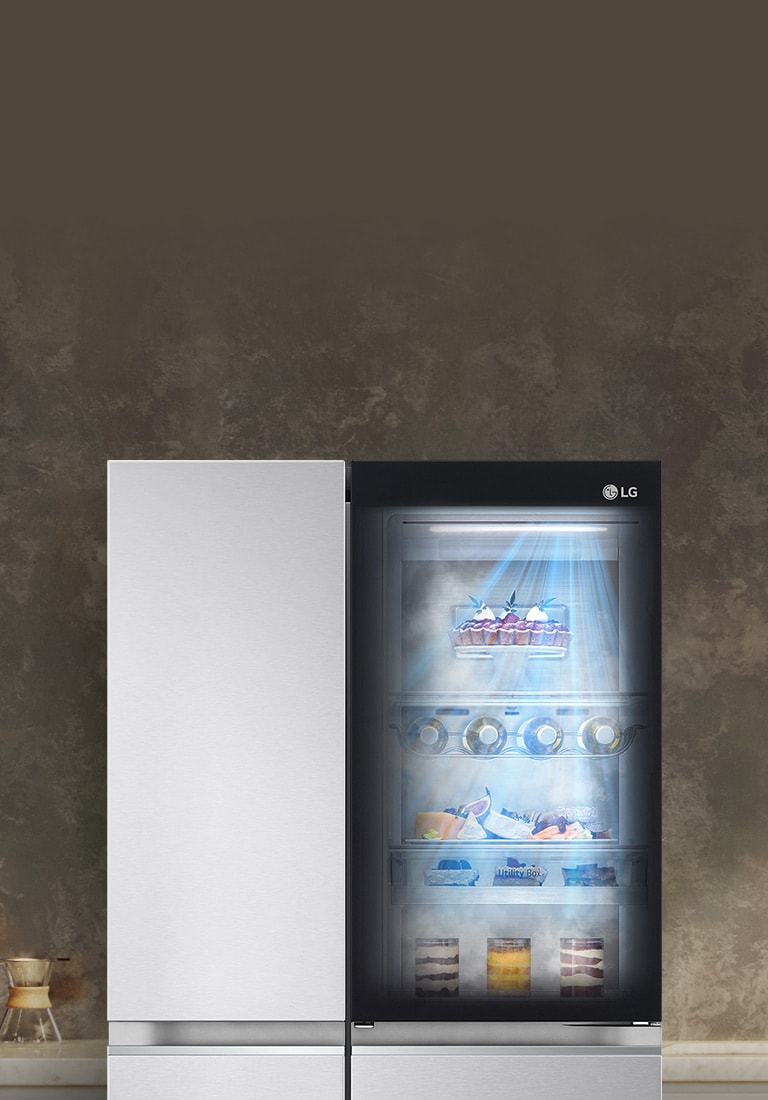 The front view of a black InstaView refrigerator with the light on inside. The contents of the refrigerator can be seen through the InstaView door. Blue rays of light shine down over the contents from the DoorCooling function. 