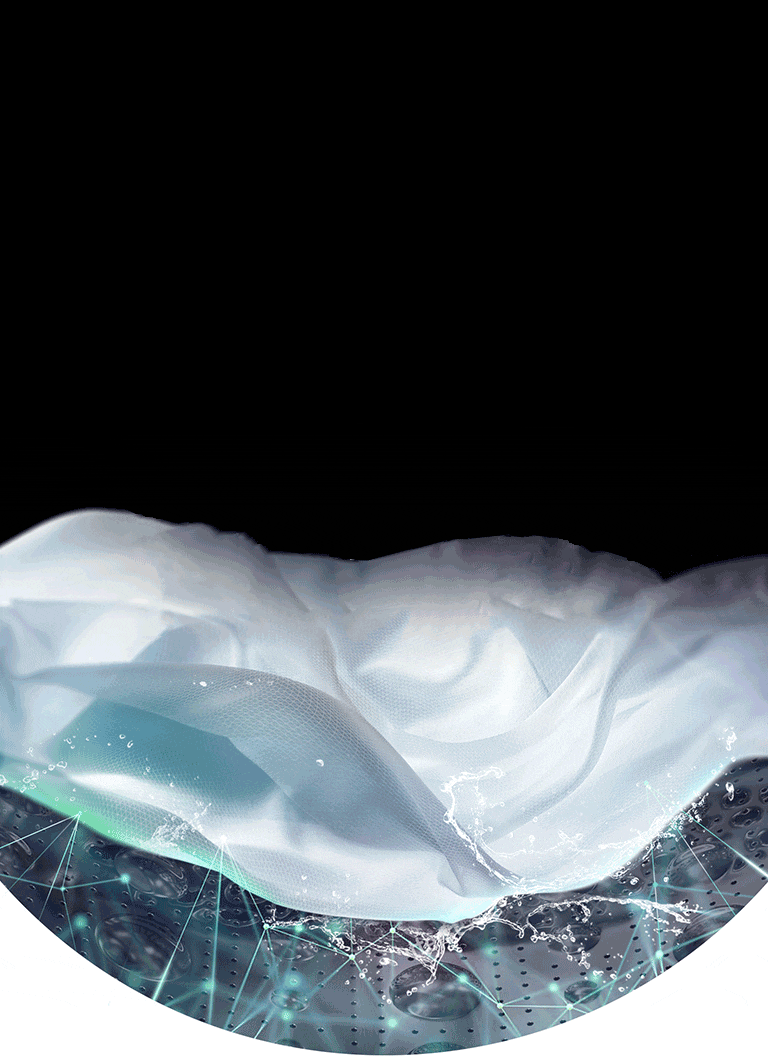 A white piece of cloth is shown in the drum of the washing machine front load washer being washed.