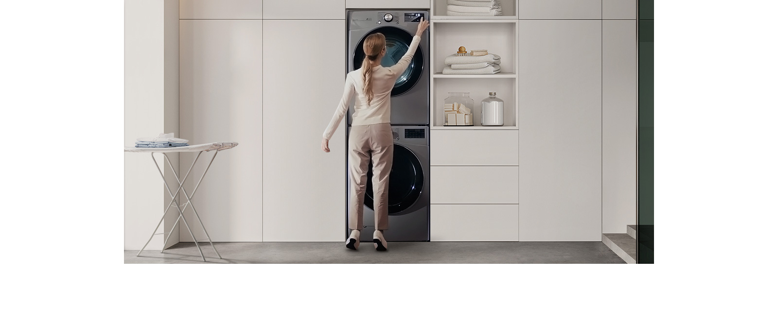 The video contains several comparison scenes. Stackable washer and dryer, each with a control panel, shows the inconvenience of an adult woman sticking out her heel to operate the panel. Meanwhile, the LG Objet Washtower™ shows that the washing machine and dryer can be centrally controlled as a single unit, so even a young boy can easily access it.