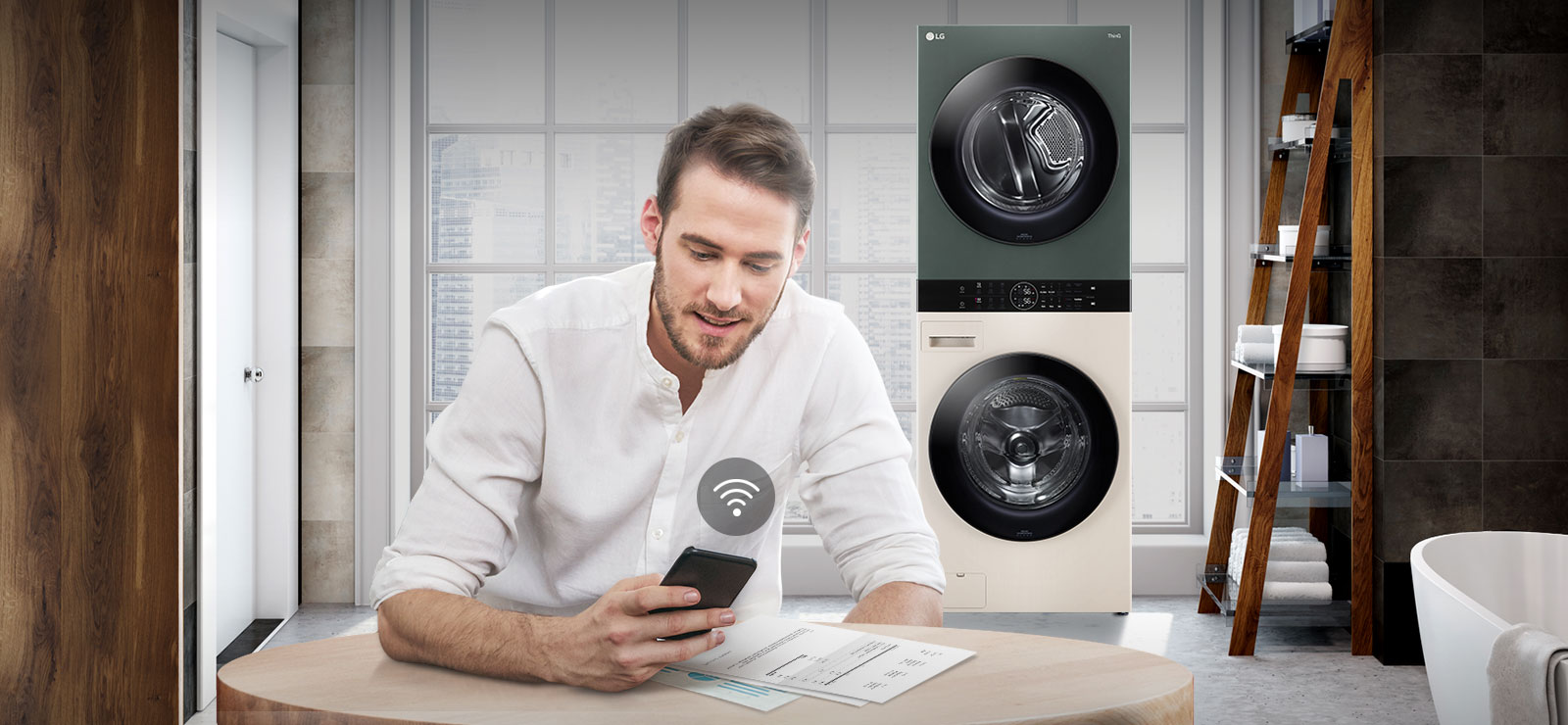 A man is monitoring the condition of the WashTower via the LG ThinQ app.