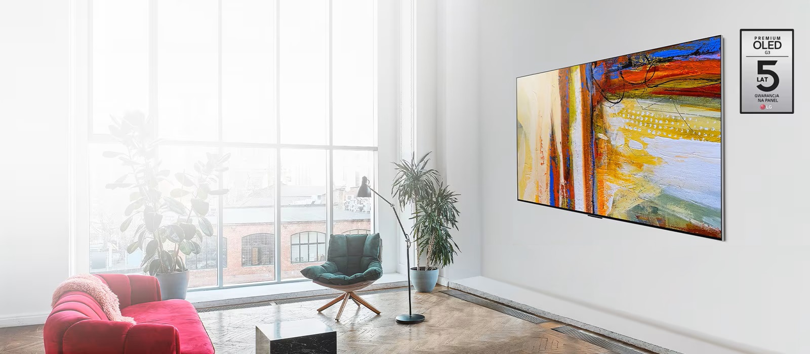 Zdjęcie telewizora LG OLED G3 przedstawiającego kolorowe abstrakcyjne dzieło sztuki w jasnym pokoju.