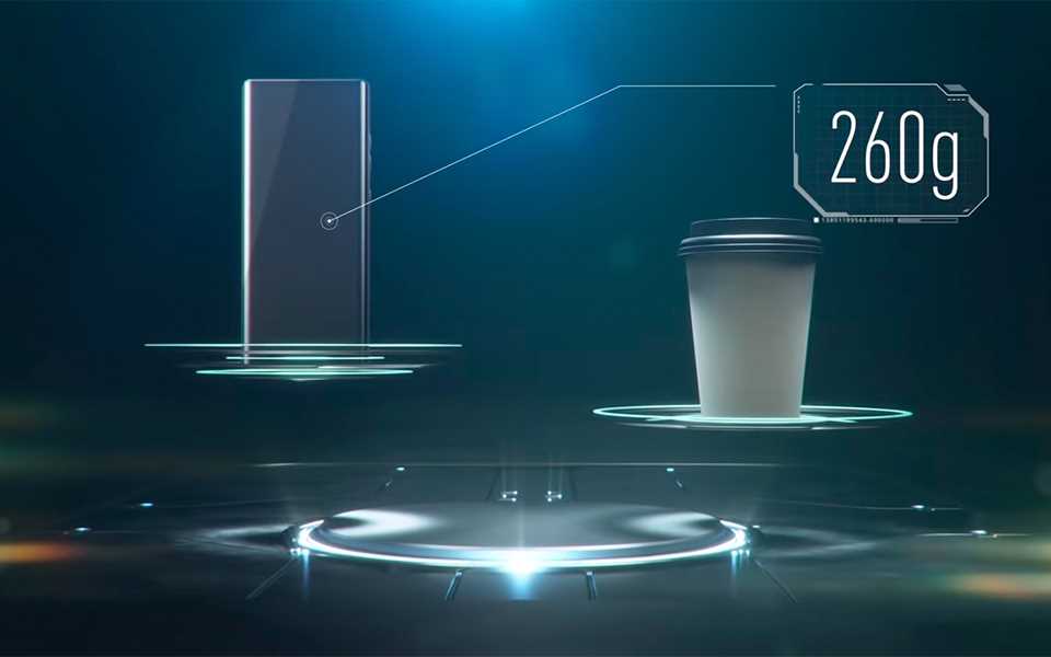 A comparison of the weight of an LG WING with that of a 260g coffee cup