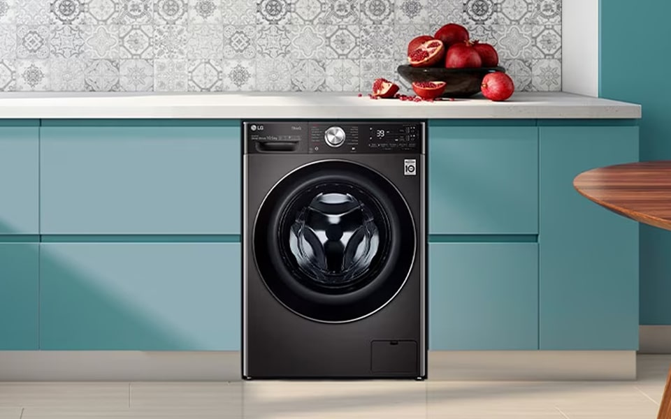LG washing machine installed in the kitchen